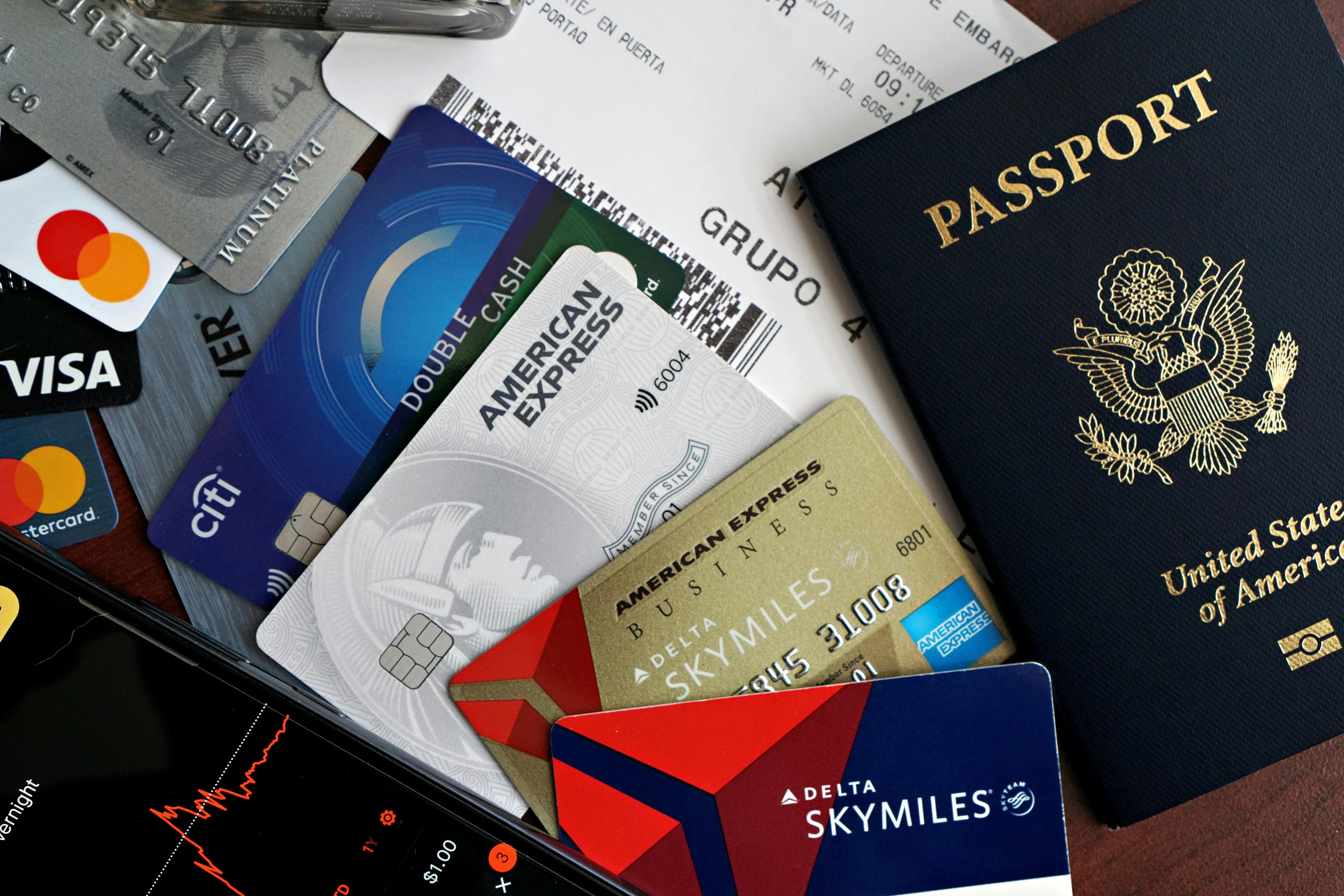 Travel credit cards with passport and boarding pass